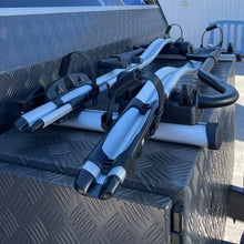 Load image into Gallery viewer, Thule Proride's Bike Rack set up on a Caravan toolbox